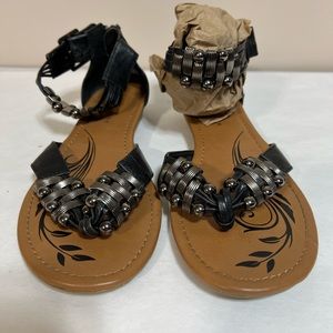 Women's size 8.5 black sandal with "gunmetal" color detail